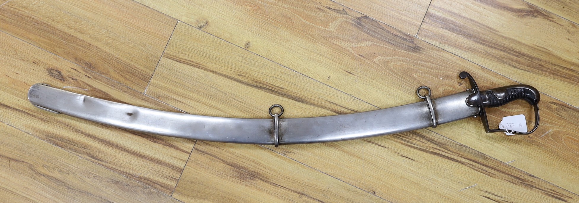 A British pattern 1796 light cavalry sabre, ‘W.S.R.’ engraved to hilt and ‘Bats’? to spine, with steel scabbard. 99cm total length